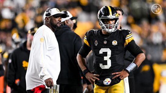 Mike Tomlin speaks with quarterback Russell Wilson during a home game for the Steelers. Mike Tomlin speaks with quarterback Russell Wilson during a home game for the Steelers.