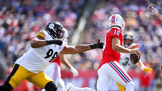 Steelers' Derrick Harmon goes after New England Patriots' quarterback Drake Maye Steelers' Derrick Harmon goes after New England Patriots' quarterback Drake Maye