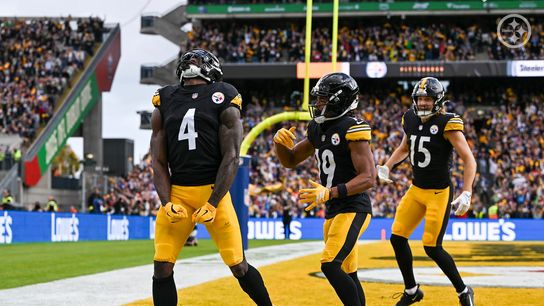 Steelers' DK Metcalf (4) celebrates with Calvin Austin III (19) and Ben Skowronek (15) after a long touchdown run in Ireland against the Minnesota Vikings during Week 4 of 2025.