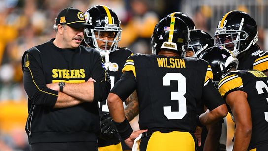 Steelers offensive coordinator Arthur Smith in the huddle with the offense before a game in 2024.