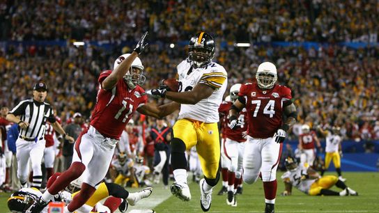 James Harrison of the Pittsburgh Steelers scores a touchdown after running back an interception for 100 yards against the Arizona Cardinals in Super Bowl XLIII. James Harrison of the Pittsburgh Steelers scores a touchdown after running back an interception for 100 yards against the Arizona Cardinals in Super Bowl XLIII.