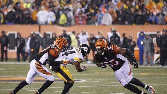 Former Pittsburgh Steelers wide receiver, Antonio Brown (#84) braces for what would be a vicious hit from Cincinnati Bengals linebacker, Vontaze Burfict Former Pittsburgh Steelers wide receiver, Antonio Brown (#84) braces for what would be a vicious hit from Cincinnati Bengals linebacker, Vontaze Burfict