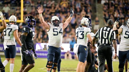 Steelers Center Zach Frazier celebrates a touchdown in college. Steelers' Zach Frazier