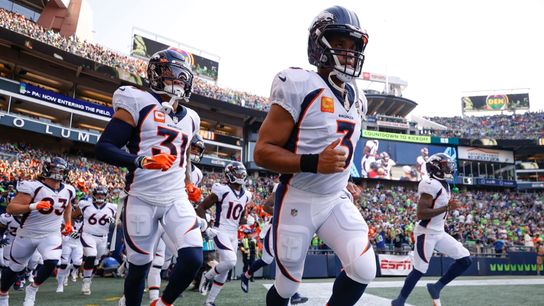 Russell Wilson (3) and Justin Simmons (31) Lead Their Team Onto The Field Steelers Russell Wilson and Justin Simmons
