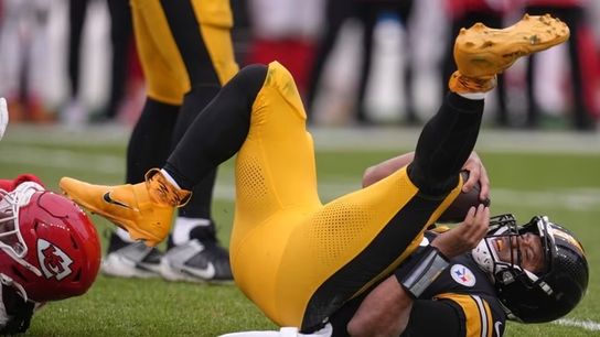 Pittsburgh Steelers' quarterback Russell Wilson is sacked by Kansas City Chiefs' defensive end Mike Danna during the second half of their Christmas Day matchup.