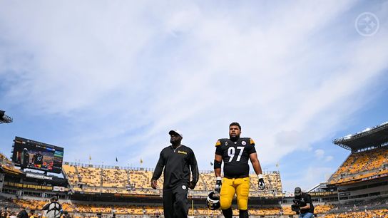 Steelers' HC Mike Tomlin and DT Cam Heyward walking off the field after a home win in Week 3, 2024. Steelers' HC Mike Tomlin and DT Cam Heyward walking off the field after a home win in Week 3, 2024.
