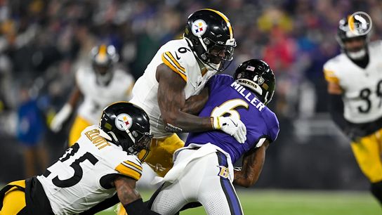 Pittsburgh Steelers' DeShon Elliott and Patrick Queen making a tackle during playoff game in Baltimore in 2024. Pittsburgh Steelers' DeShon Elliott and Patrick Queen making a tackle during playoff game in Baltimore in 2024.