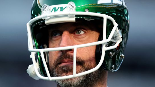 Former New York Jets' QB Aaron Rodgers looks on during a game Former New York Jets' QB Aaron Rodgers looks on during a game