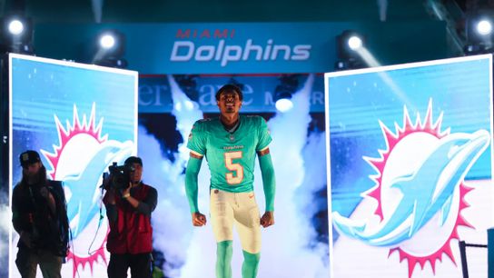Miami Dolphins' CB Jalen Ramsey celebrating running through the tunnel.