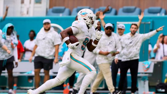 Steelers' newly acquired TE Jonnu Smith running for a big play while fellow players and coaches celebrate. Steelers' newly acquired TE Jonnu Smith running for a big play while fellow players and coaches celebrate.
