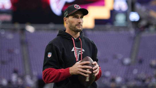 Kirk Cousins in his time with the Atlanta Falcons warming up before a game Kirk Cousins in his time with the Atlanta Falcons warming up before a game